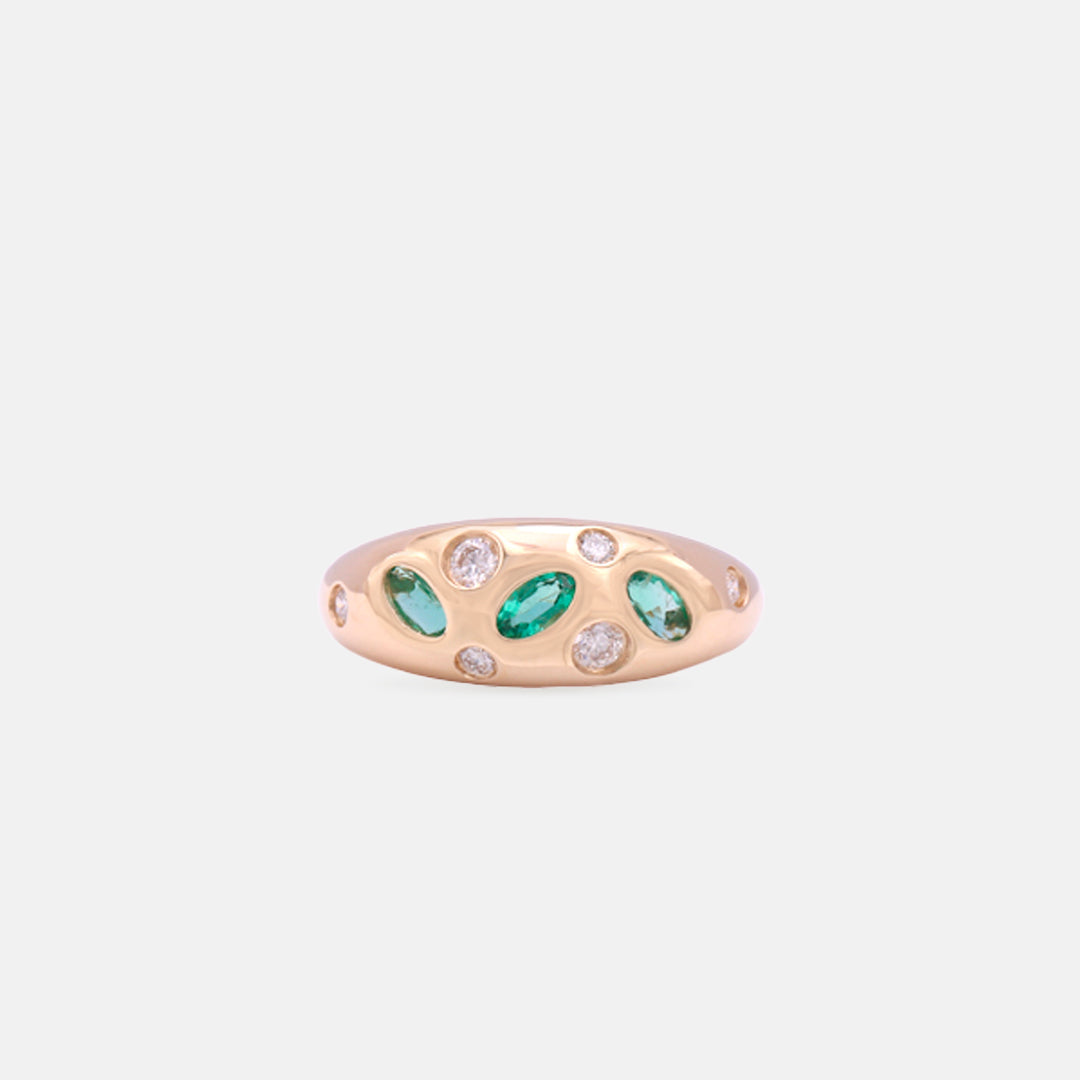 Emerald and diamond bombé ring