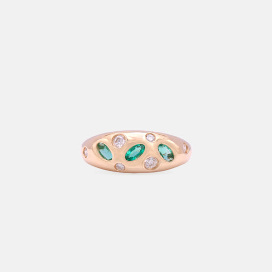 Emerald and diamond bombé ring