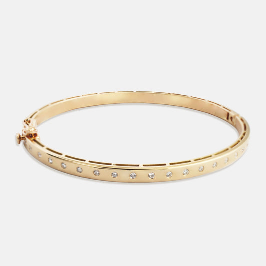 Orbit Bangle in Gold and Diamonds